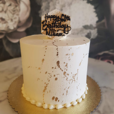  "Indulge in the luxury of our exquisite Gold Splash Cake – a symphony of elegance and taste that will make your celebrations shine brighter than ever! ✨🍰 #GoldenIndulgence #CelebrateInStyle"