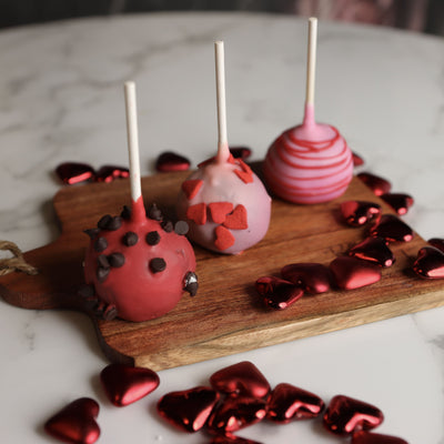 red and pink cake pops, singles, romance, date, sleep over, valentine plans, movie, reservation las vegas, vegas valentines, small business, bakery las vegas, women owned