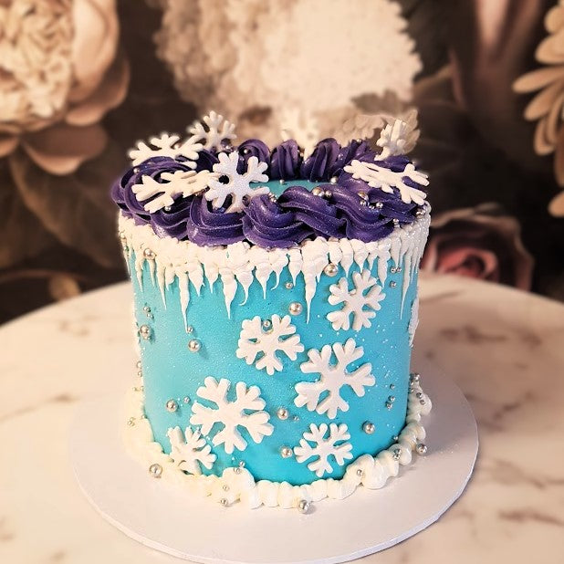 Winter themed cake, winter palette cake, holiday cake vegas, bakery near me, birthday cake, vegas cake delivery, Capricorn birthday, January cake, snow cake, snowflake, 8 year old girl party theme, girls cake Elsa and Anna, frozen cake, Olaf cake