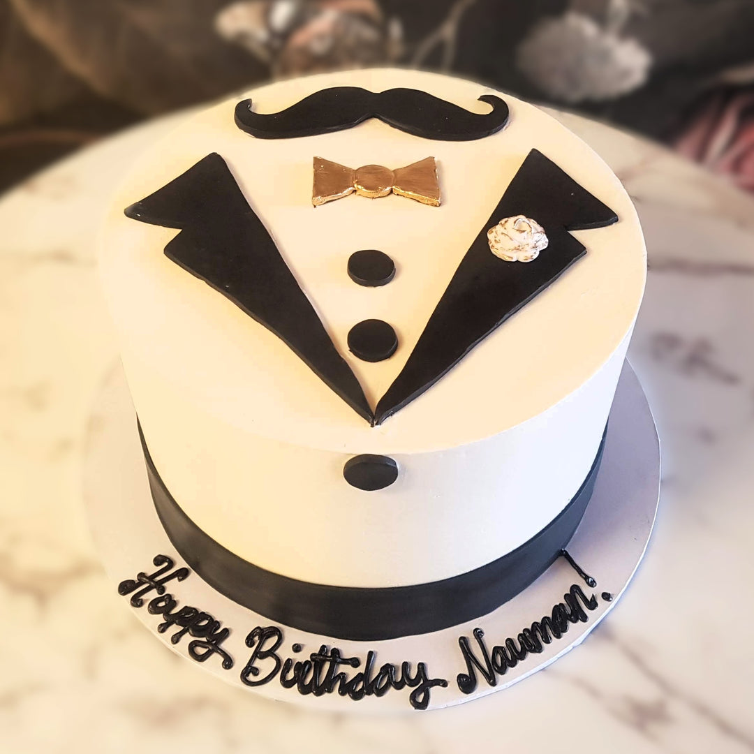 25 Modern and Stylish Birthday Cakes for Men in 2026 21 https://www.rollingindoughbakerylv.com/cdn/shop/files/Suited_Sweetness.jpg?v=1741820025&width=1080