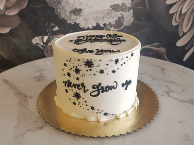 Never Grow Up Cake | Rolling in Dough | Delivery