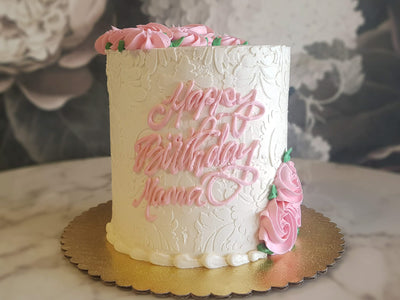    Any proper lady would love to celebrate their special day with our Soft Elegance design. Covered with our classic Italian meringue buttercream, our decorators tediously palette paint every damask pattern on the base cake- HA! Just kidding. It's a damask stencil. We hold our breath and apply the pattern hoping that it makes the perfect imprint on our bas