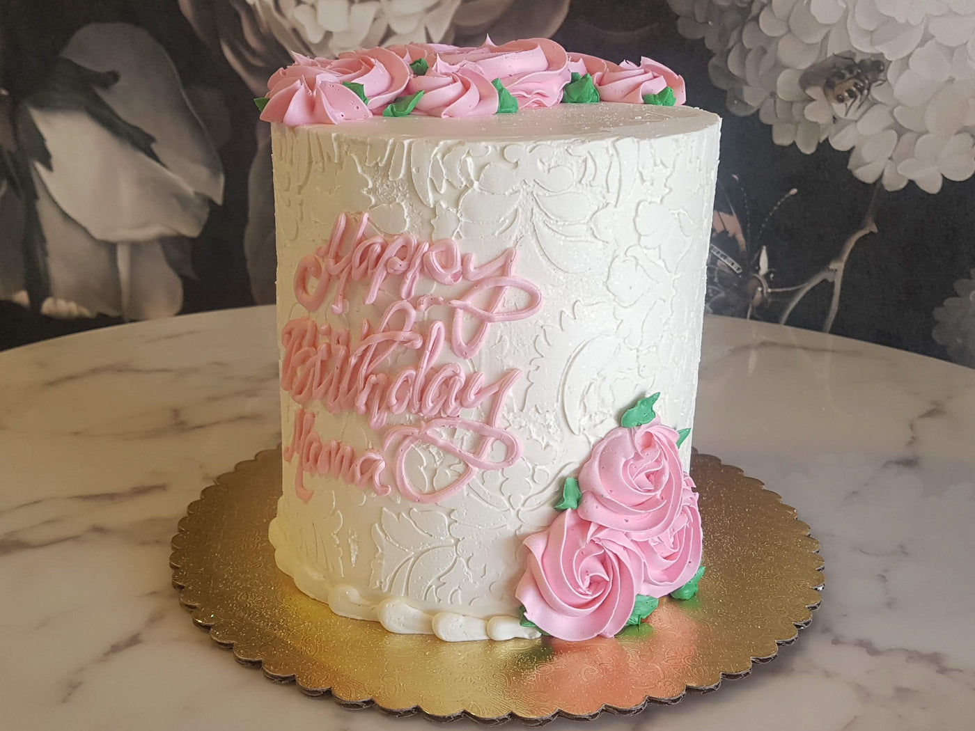    Any proper lady would love to celebrate their special day with our Soft Elegance design. Covered with our classic Italian meringue buttercream, our decorators tediously palette paint every damask pattern on the base cake- HA! Just kidding. It's a damask stencil. We hold our breath and apply the pattern hoping that it makes the perfect imprint on our bas