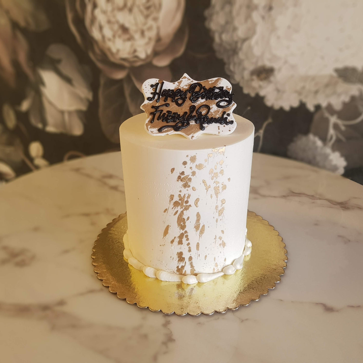  "Indulge in the opulence of our Gold Splash Cake – where every slice is a celebration of luxury and decadence! ✨🍰 #GoldenIndulgence #CakePerfection #CelebrationEssentials"